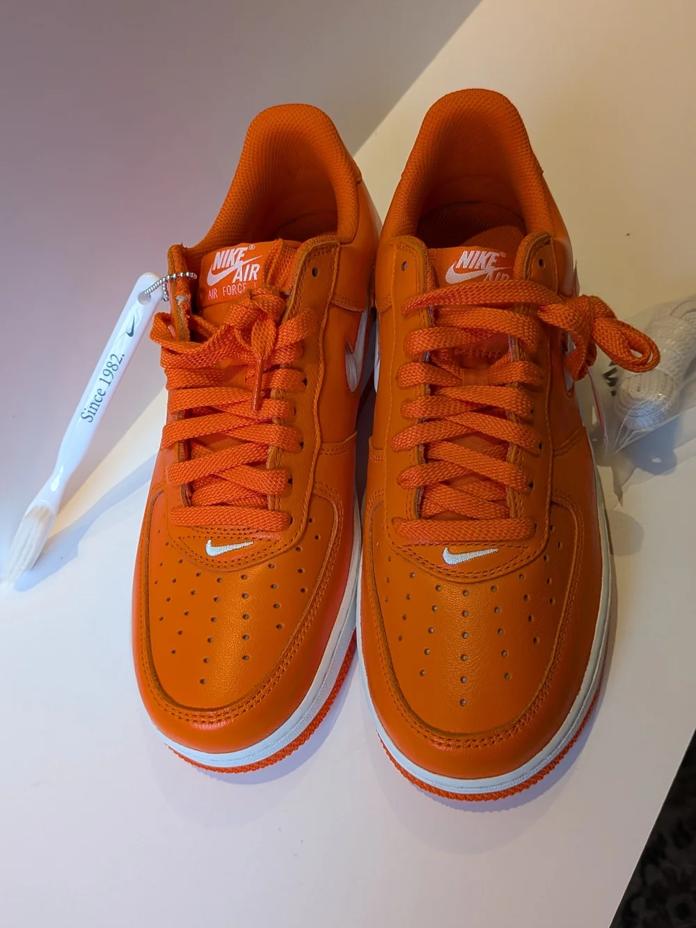 NWT Nike Air Force 1 Men's Orange Low-Top Sneakers with Jewel Swoosh